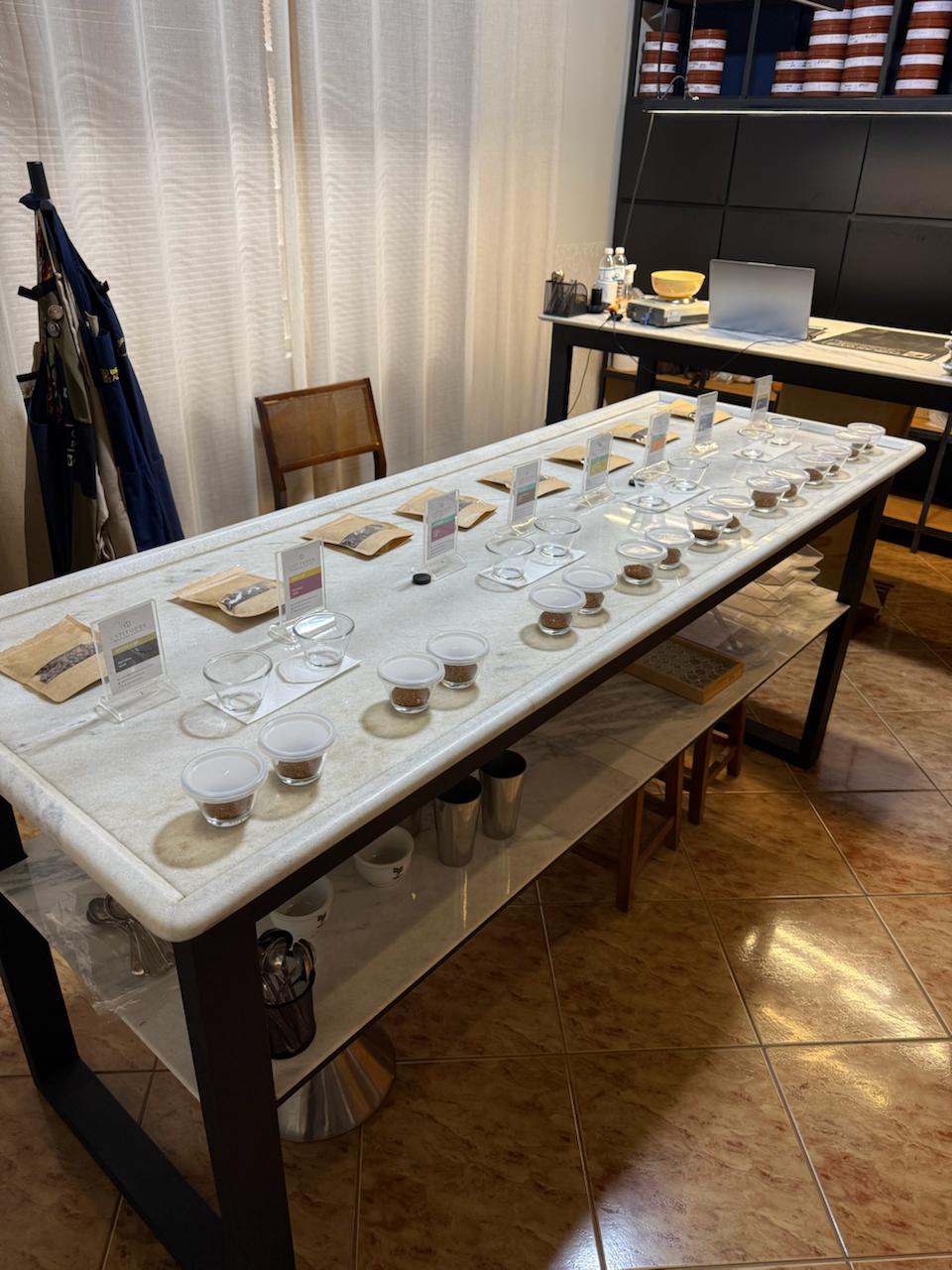 Coffee cupping table prepared for quality evaluation